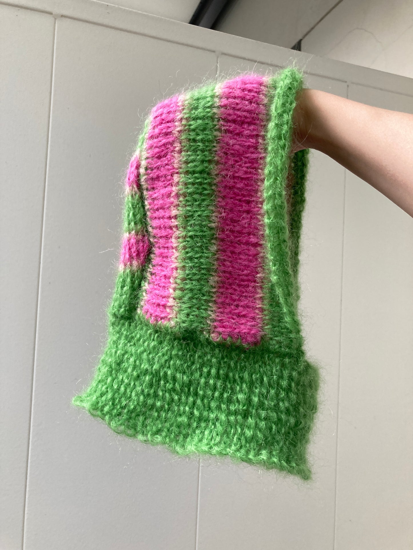 The balaclava green and pink stripes