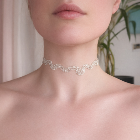 Silver choker with baroque style element