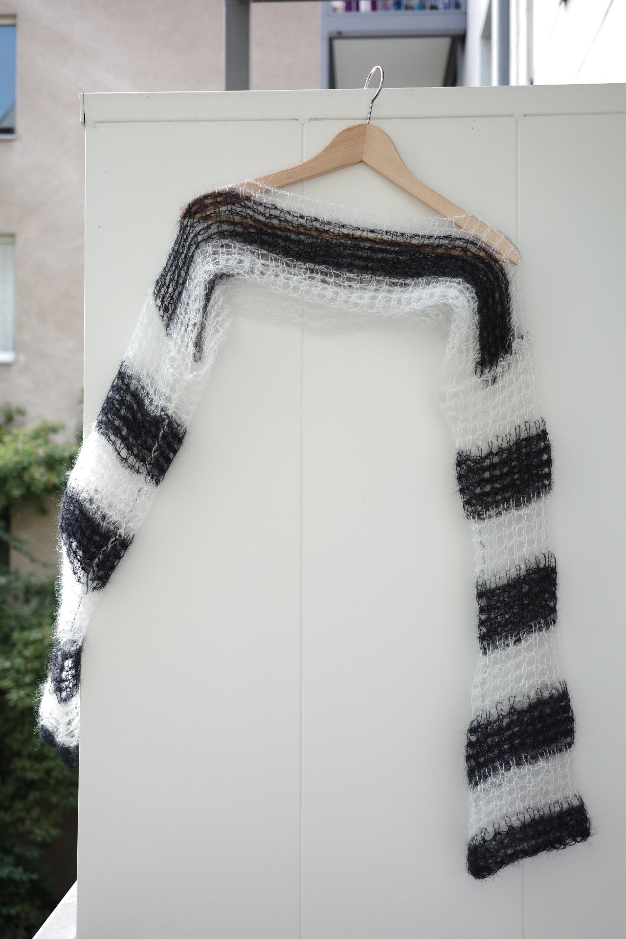 Black and white sleeve sweater