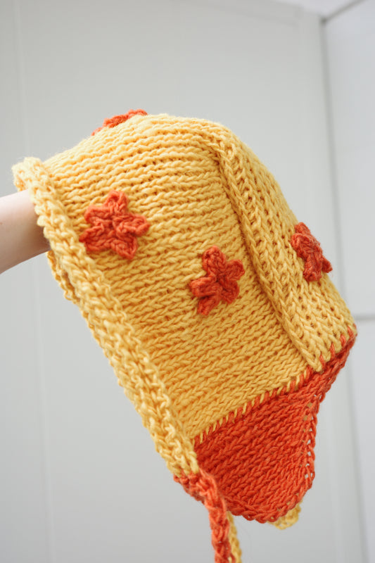Naive Flower bonnet ! Yellow with orange flowers !