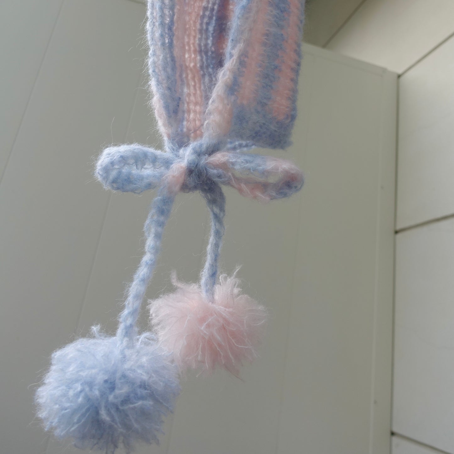 The blue-pink bonnet with pompons