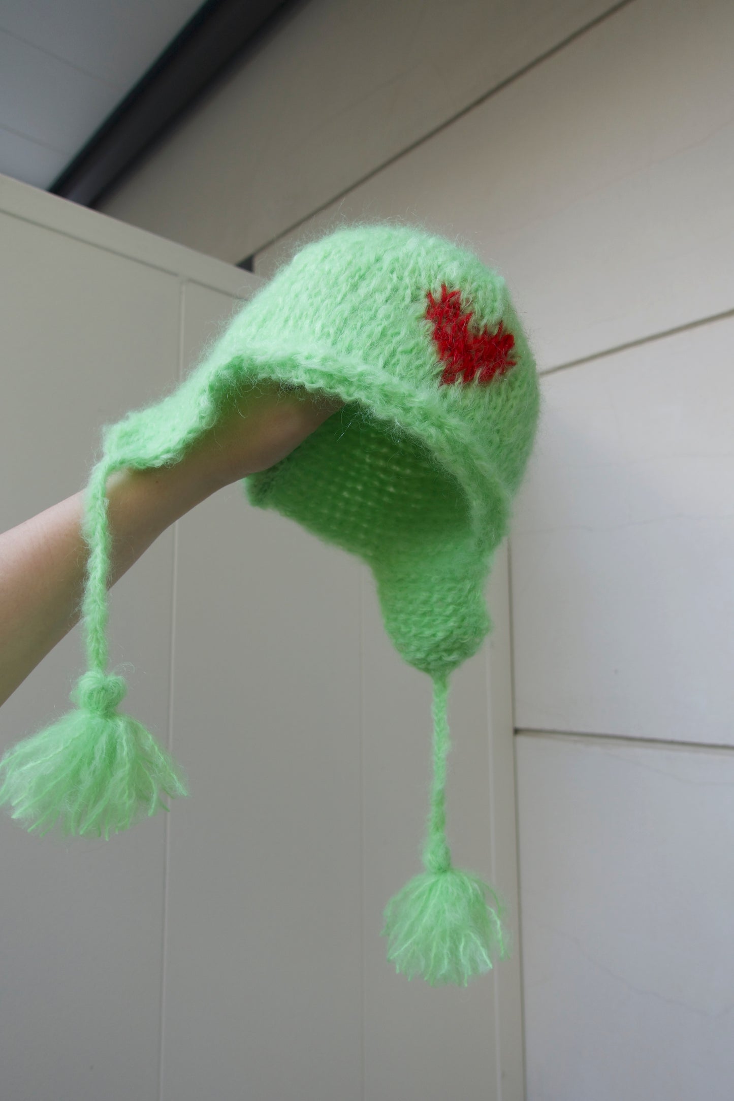 The green "Love" hat with red heart