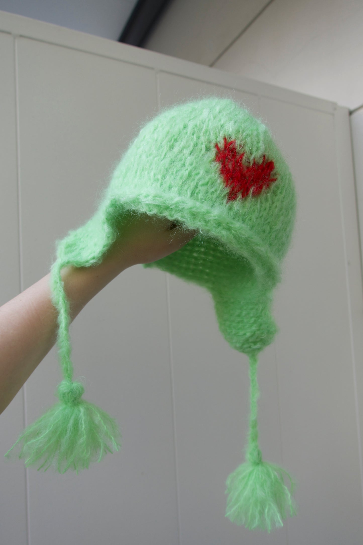 The green "Love" hat with red heart